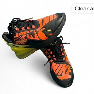 This is a Nike Air Max 270 in the Black, Yellow, and Crimson colorway.